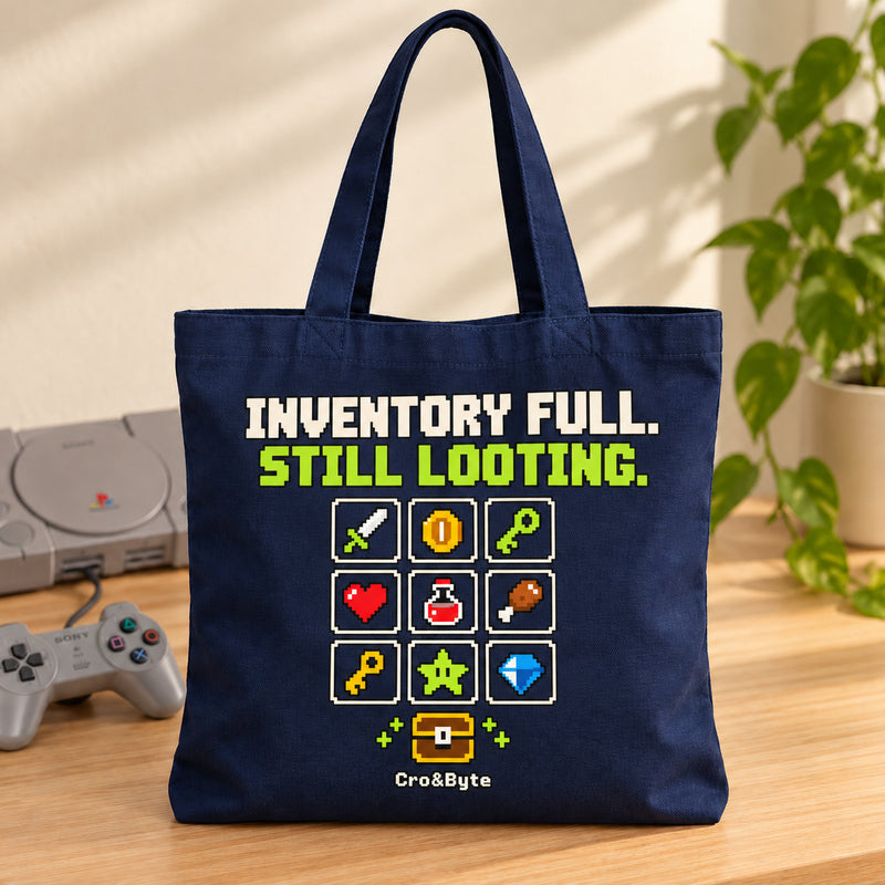 Inventory Full. Still Looting. — Tote Bag — styled product photo with matching original PlayStation console and controller