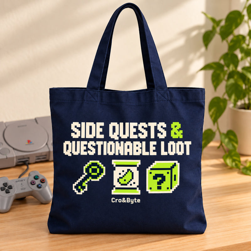Side Quests & Questionable Loot — Tote Bag — styled product photo with matching original PlayStation console and controller